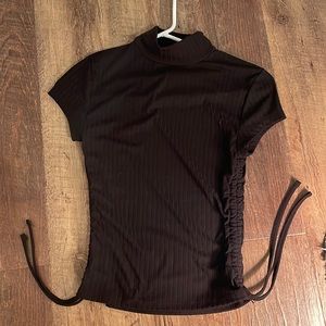 dress shirt with ties on the bottom and turtle neck